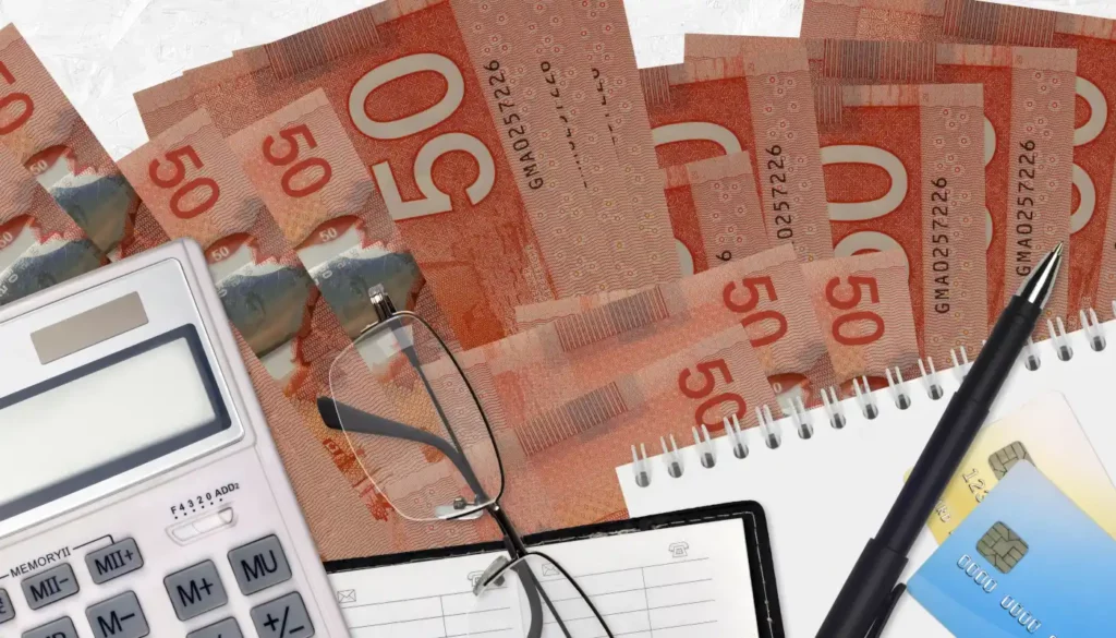Sole proprietor in Edmonton reviewing business expenses and receipts for tax write-offs